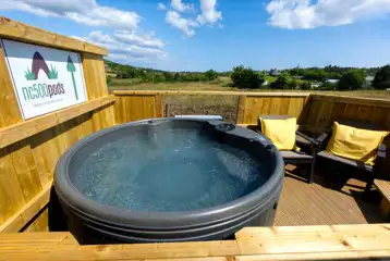 Glamping pod with hot tub