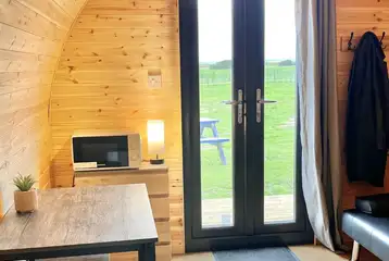 Luxury pod dining area and sofa bed