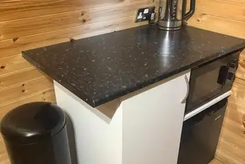 Camping pod mini fridge, microwave and kettle