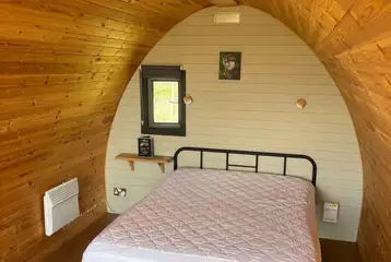 Camping pod with a double bed and sofa bed