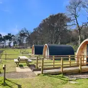 Camping pods with picnic benches