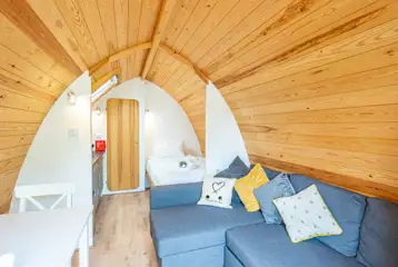 Glamping pod (with optional two person hot tub), sofa, bed, seating and kitchen