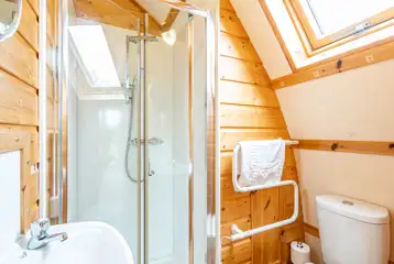 Glamping pod ensuite with shower, toilet and sink