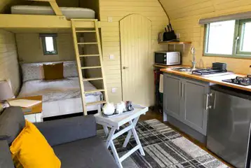 Family glamping pod with double bed, bunk beds, kitchenette and ensuite Family glamping pod with double bed, bunk beds, kitchenette and ensuite
