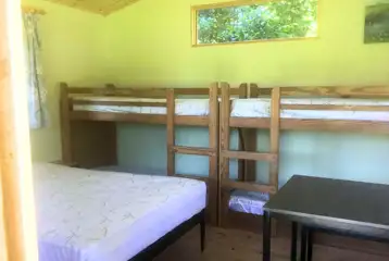Primrose cabin with a double bed and two bunk beds Primrose cabin with a double bed and two bunk beds
