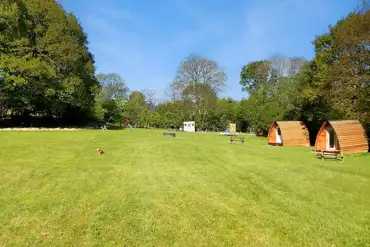 Grass pitches and camping pods