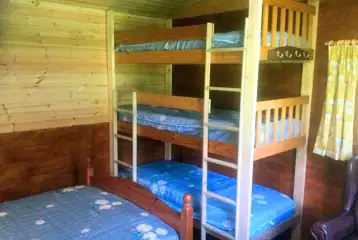 Buttercup cabin double bed and triple bunk Buttercup cabin double bed and triple bunk