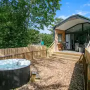 Stargazer glamping cabin with hot tubs and fenced garden areas Stargazer glamping cabin with hot tubs and fenced garden areas