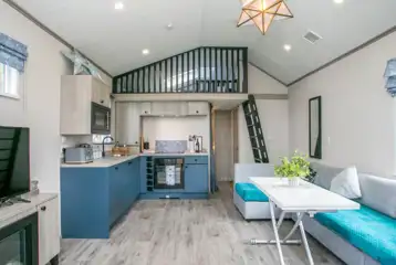Stargazer glamping cabin living and kitchen area Stargazer glamping cabin living and kitchen area