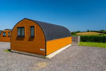 Glamping pods with countryside views