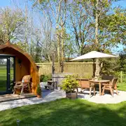 Bracken glamping pod with a barrel hot tub at The Paddock Pods at Homeland