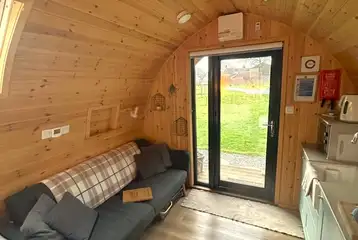 Willow pod sofa bed, TV/DVD player and kitchen