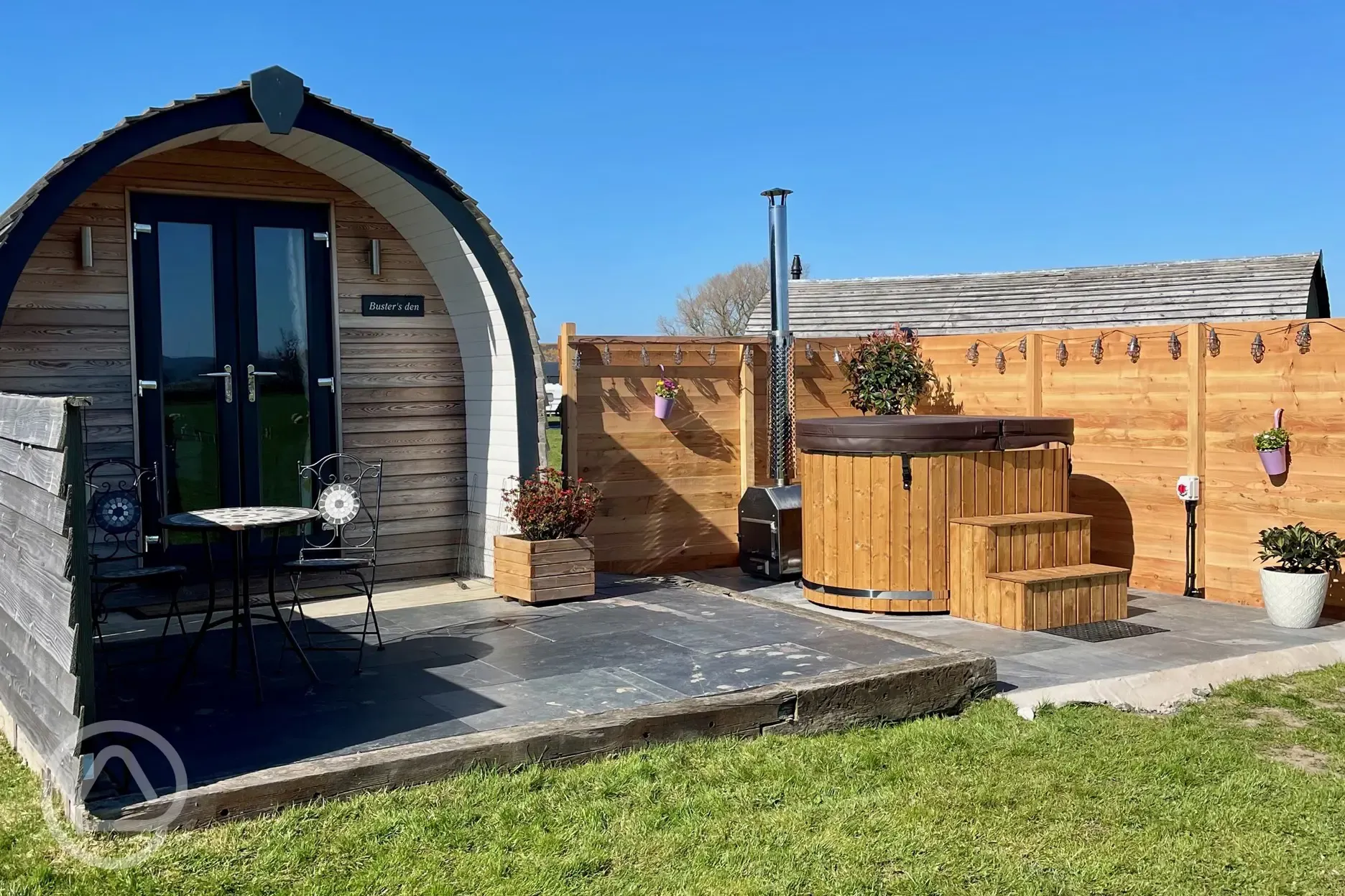 Luxury ensuite glamping pod with wood-fired hot tub hydro spa