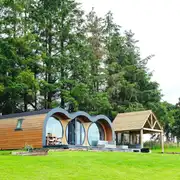 Eight person (Severn) pod with a patio and covered hot tub Eight person (Severn) pod with a patio and covered hot tub