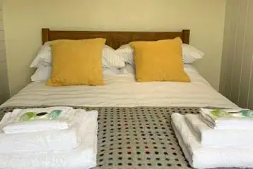 Six person (Wye) pod double bedroom with bedding Six person (Wye) pod double bedroom with bedding