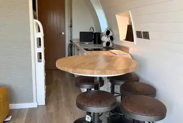 Edw glamping pod kitchenette with a breakfast bar
