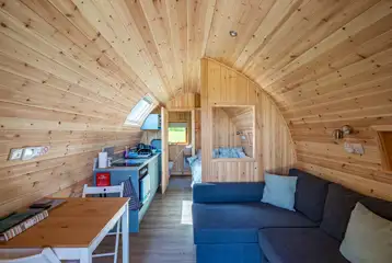 Four person pod with a double bed and double sofa bed (bedding included)
