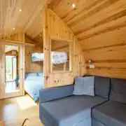 Five person glamping pods with a double bed, single bunk and double sofa bed