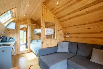 Five person glamping pods with a double bed, single bunk and double sofa bed