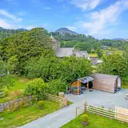 Aerial of the glamping pod and hot tub at Church House overlooking Coniston