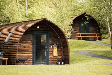 Foxwood pods exterior with private hot tubs and fire pits Foxwood pods exterior with private hot tubs and fire pits