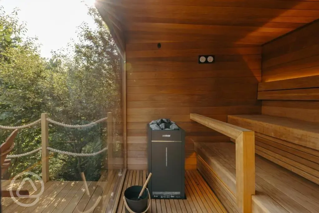 Onsite sauna interior, with woodland views Onsite sauna interior, with woodland views