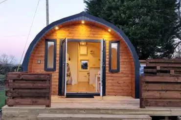 The Roost glamping pod exterior with private decking and hot tub