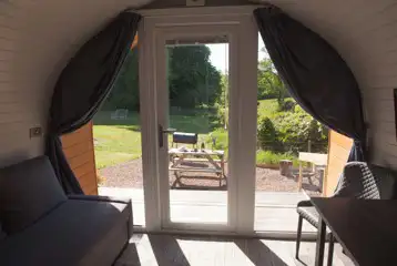 View from the Nest glamping pod with outdoor seating and fire pit View from the Nest glamping pod with outdoor seating and fire pit