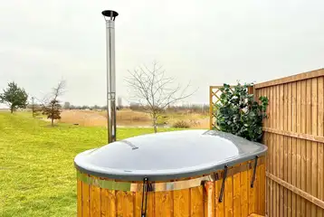 Optional wood-fired hot tub for the Winnie cabin