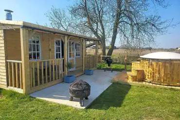 Old stables cabin with private patio, fire pit, and optional wood-fired hut tub