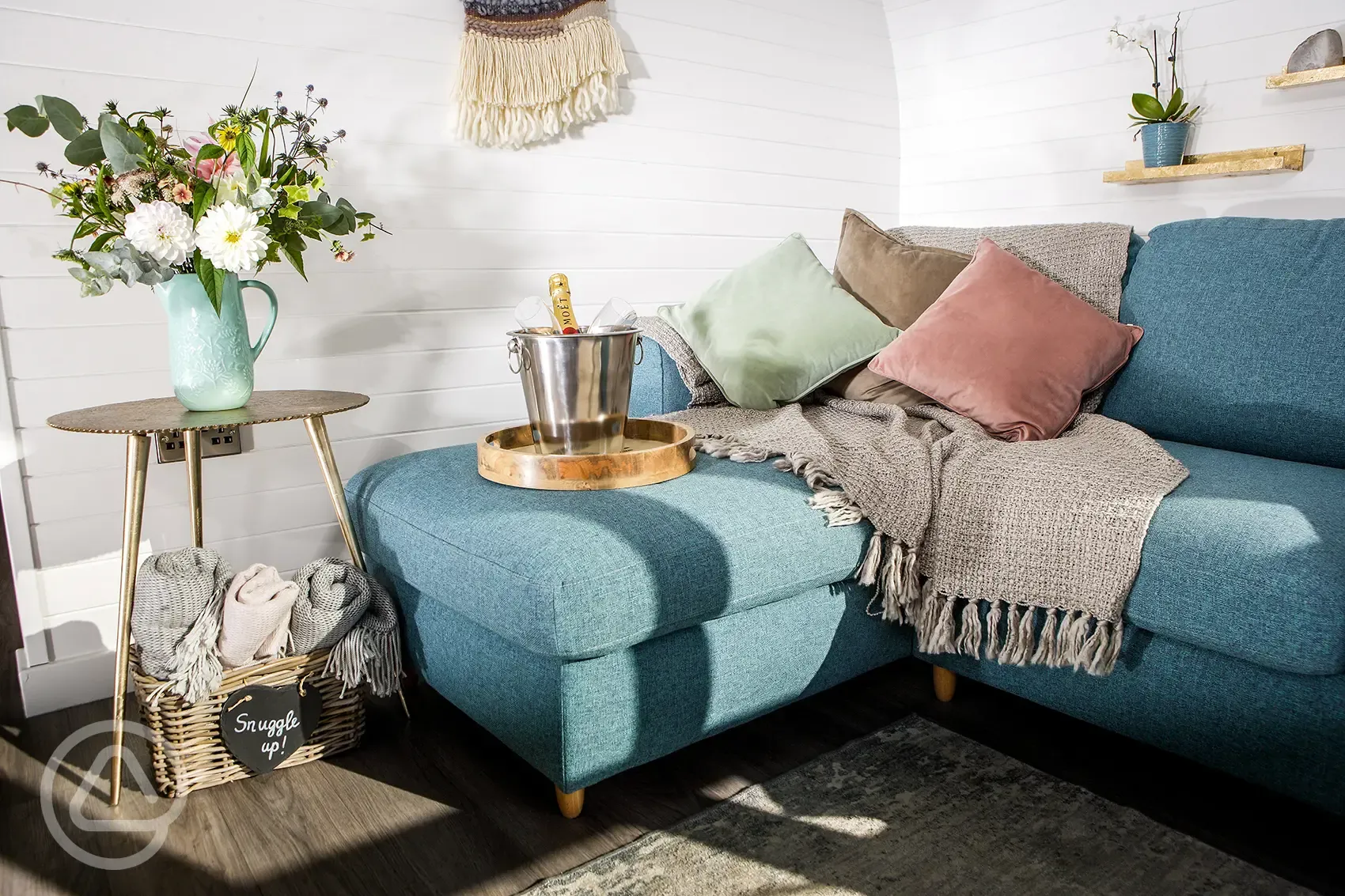 White Clover ensuite pod sofa bed with blankets and special occasion prosecco White Clover ensuite pod sofa bed with blankets and special occasion prosecco