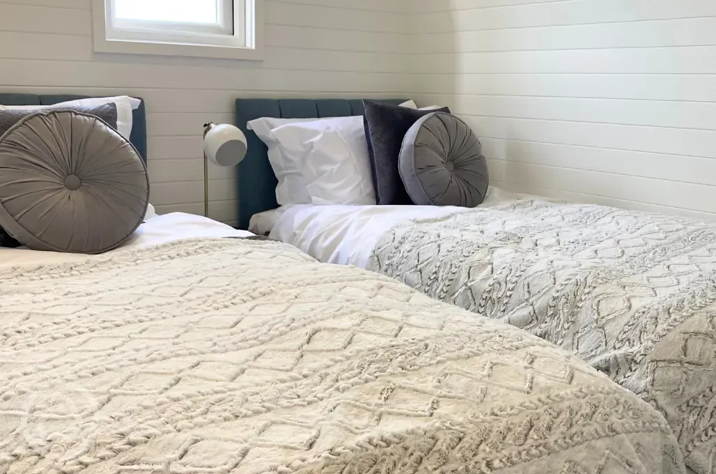 White Clover ensuite pod twin beds in a separate room (bedding provided) White Clover ensuite pod twin beds in a separate room (bedding provided)
