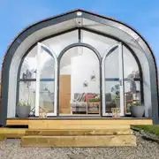 Heather ensuite pod exterior and lounge area with a Smart TV (dog friendly) Heather ensuite pod exterior and lounge area with a Smart TV (dog friendly)