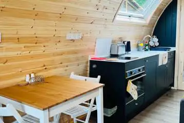 Glamping pod kitchenette and dining area