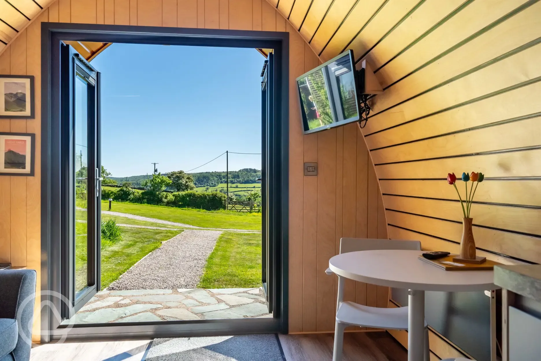 Glamping pod dining area and TV