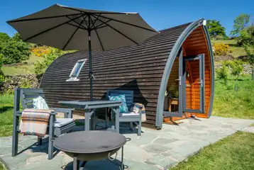 Glamping pod outdoor seating area and fire pit Glamping pod outdoor seating area and fire pit