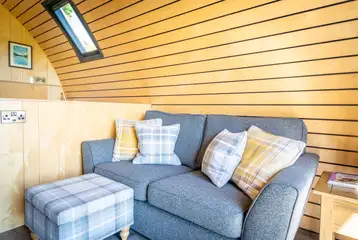 Glamping pod sofa and plug sockets