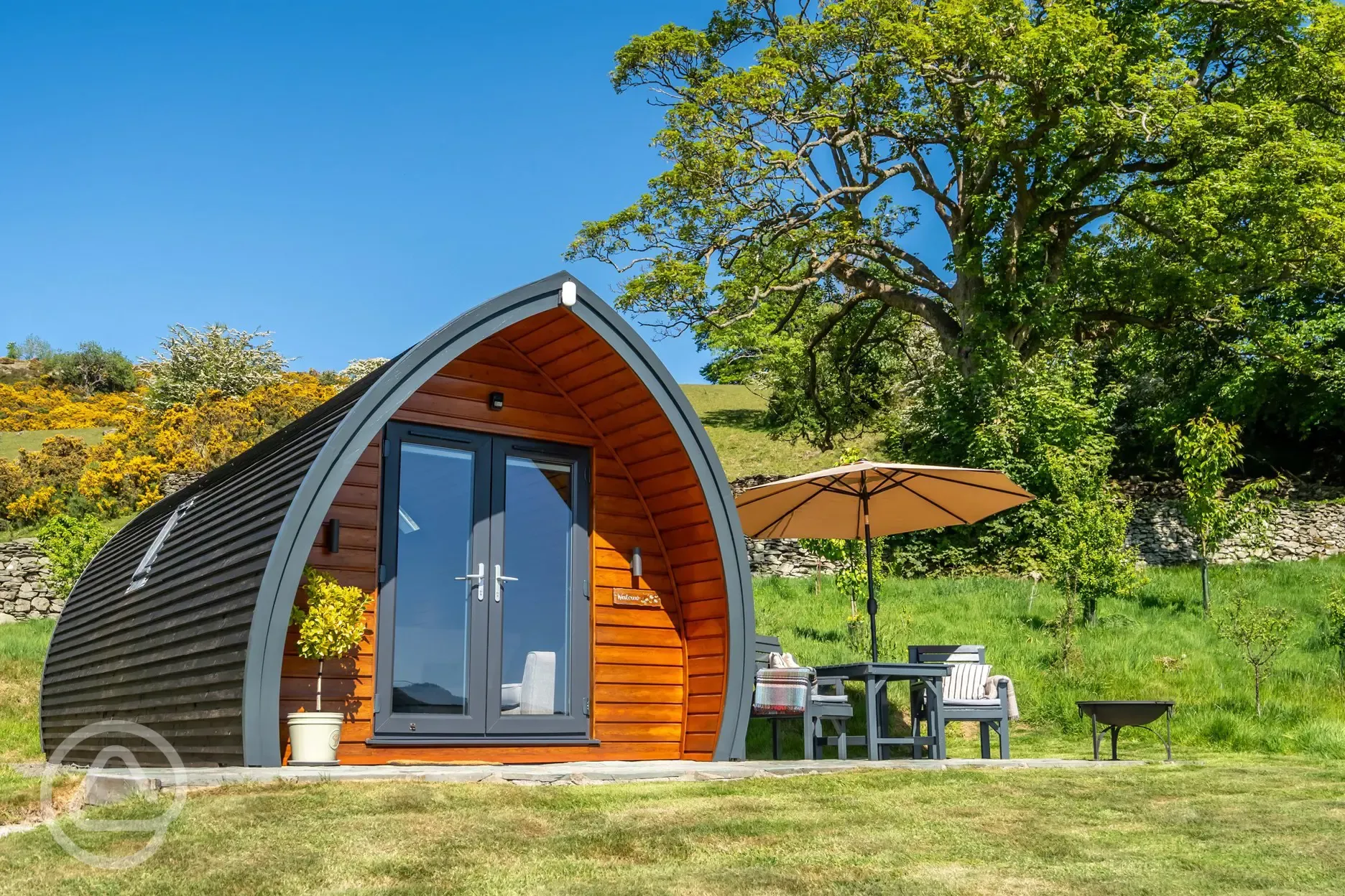 Glamping pod and outdoor seating area