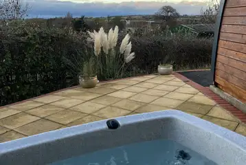 Owl pod hot tub and patio