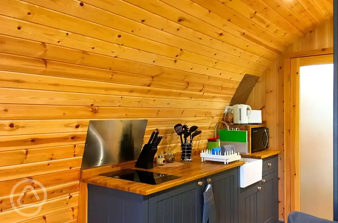 Pod kitchenette with hob, microwave, fridge, kettle, toaster and utensils Pod kitchenette with hob, microwave, fridge, kettle, toaster and utensils