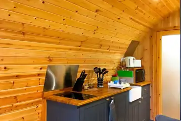 Pod kitchenette with hob, microwave, fridge, kettle, toaster and utensils Pod kitchenette with hob, microwave, fridge, kettle, toaster and utensils