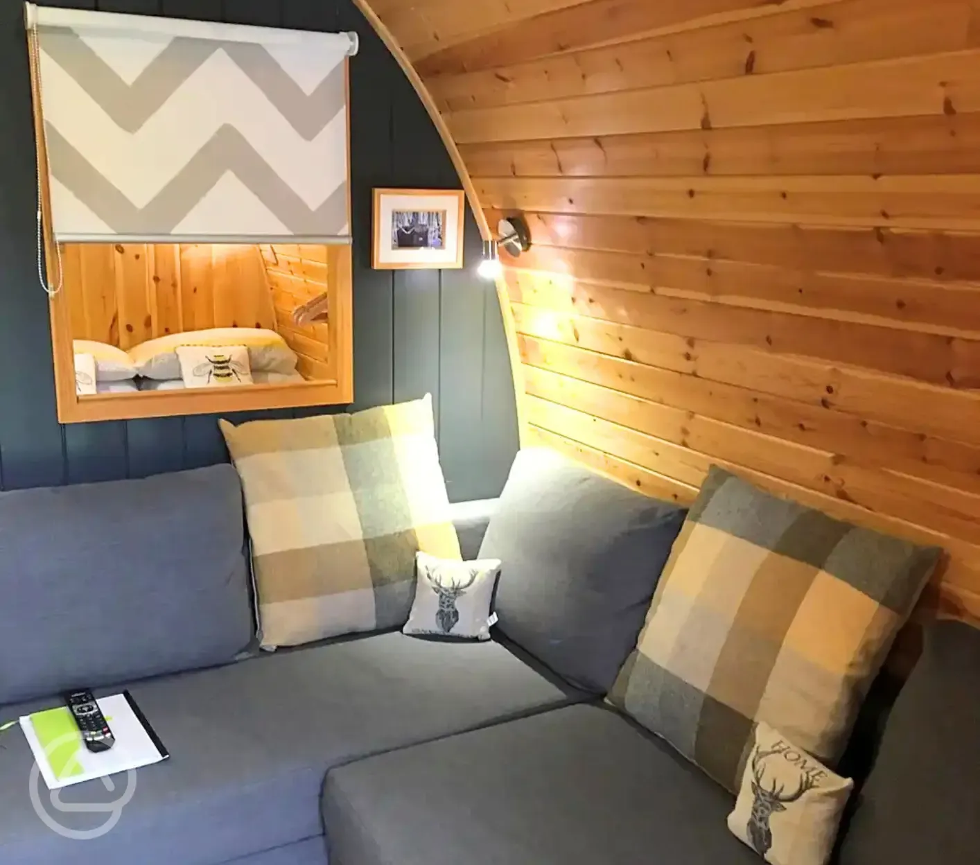 Pod lounge area with sofa Pod lounge area with sofa