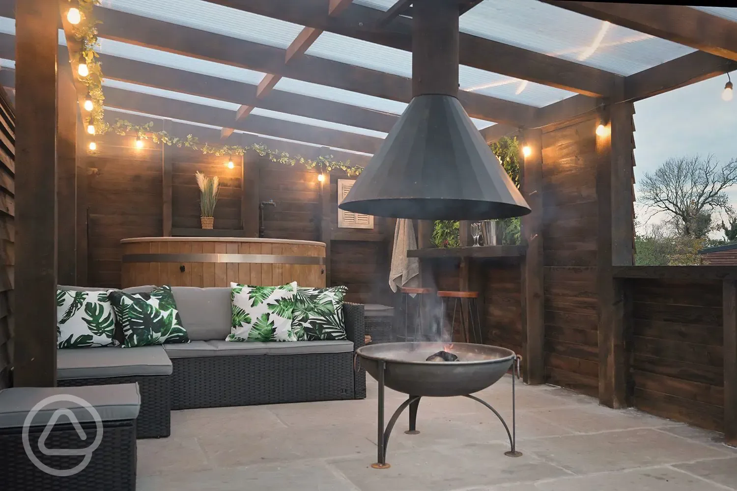 Private patio area with a fire pit at the Moorlands, Waitby and Greenrigg pods