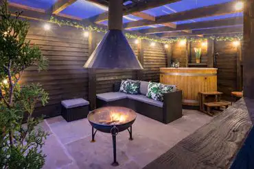 Exterior of the Waitby deluxe ensuite pod with hot tub at Sandwath Farm 