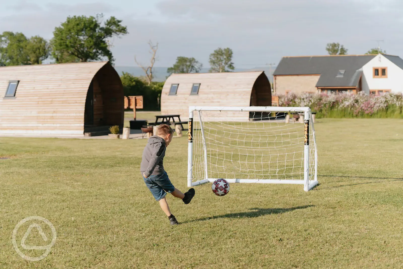 Football goals beside the glamping pods