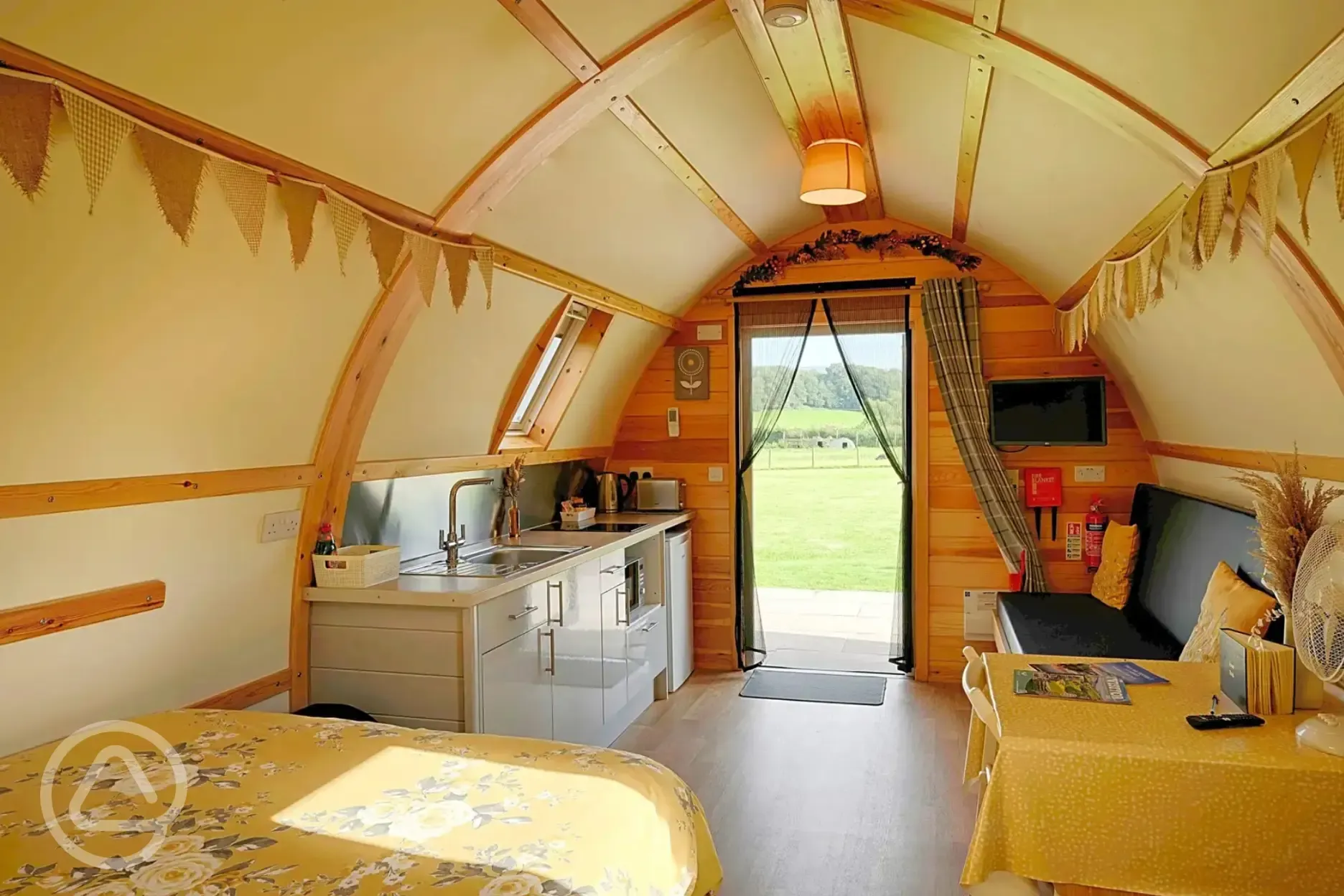 Kitchenette and seating area in the Smardale ensuite glamping pod