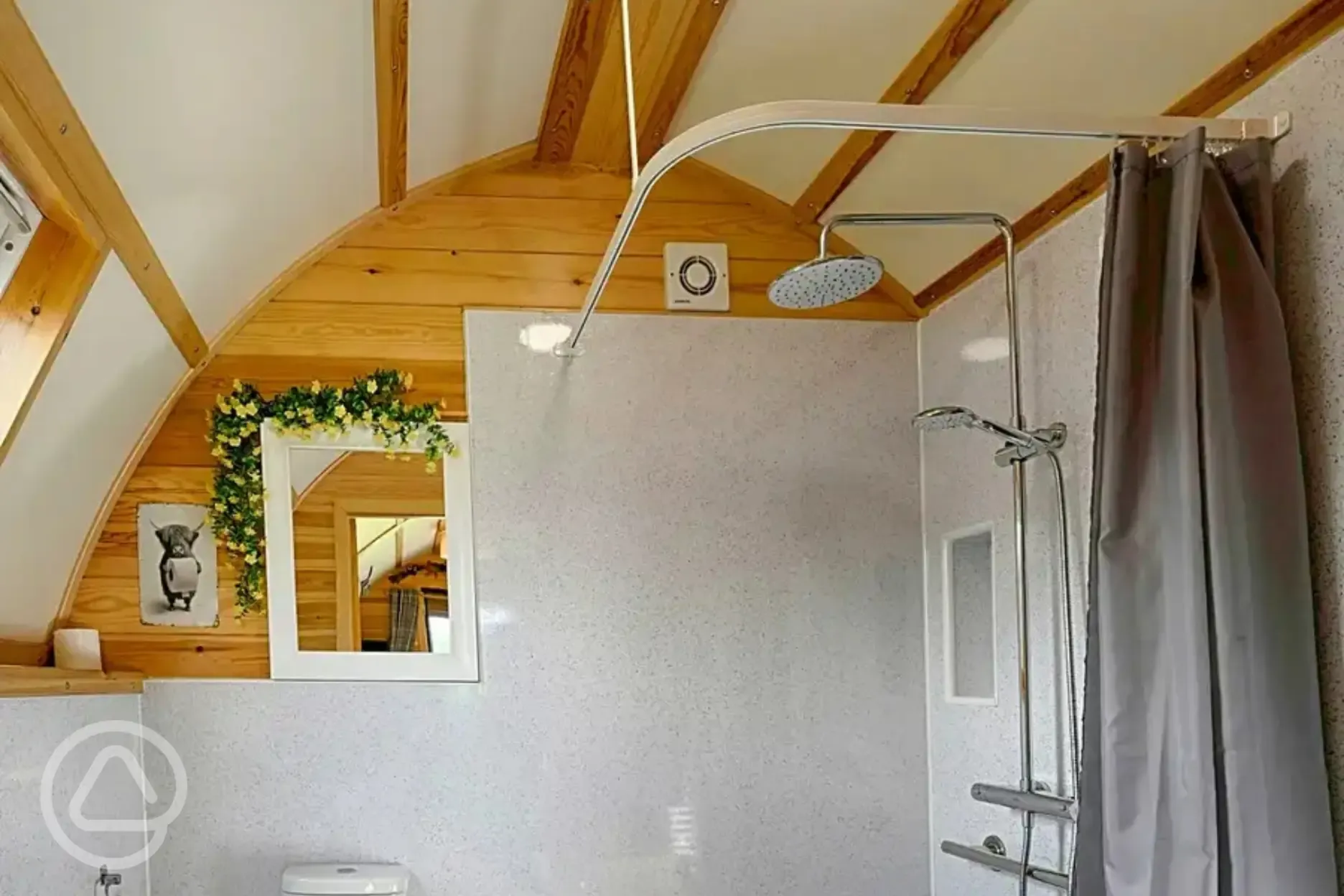 Accessible ensuite shower with a toilet and handwashing sink in the Smardale pod