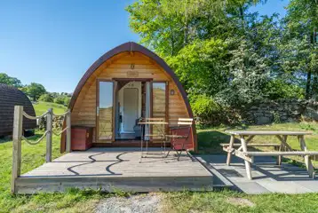 Glamping pod and outdoor seating area Glamping pod and outdoor seating area