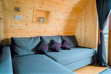 Glamping pod sofa area