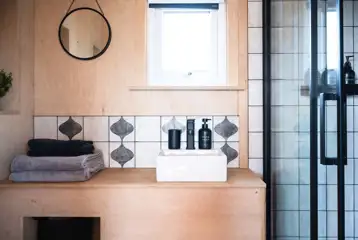 Glamping cabin ensuite bathrooms with eco toilets and showers